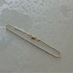 14kt. Yellow gold diamond cut rope bracelet with lobster clasp.